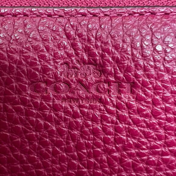 Coach Foldover Crossbody Clutch in the color Dark Fuchsia leather w/ charm NWT - Picture 9 of 13